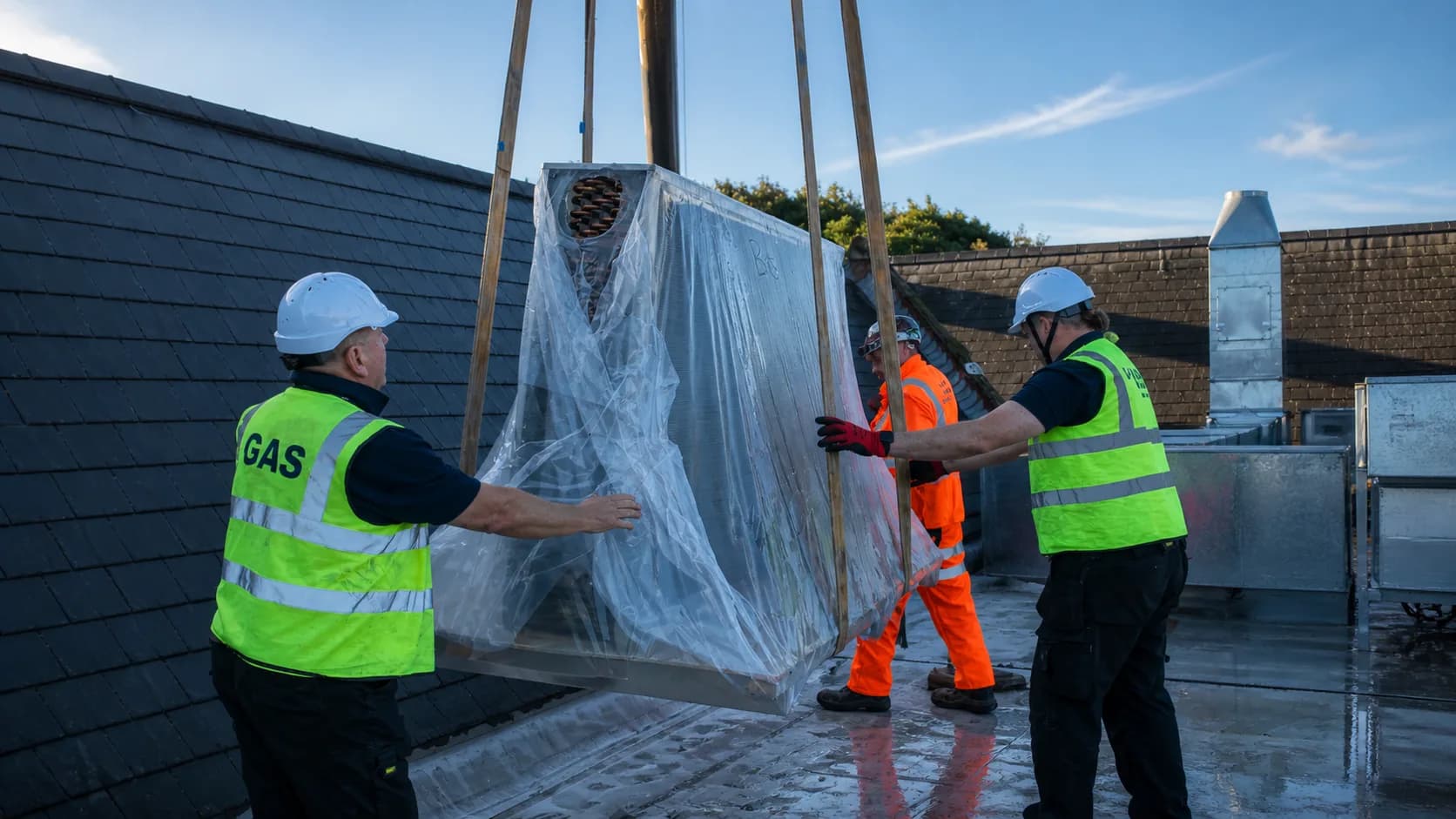 Replacement coil being fitted into air handling unit on-site