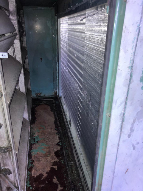 Degraded frost coil removed from AHU at Farnborough car dealership prior to replacement