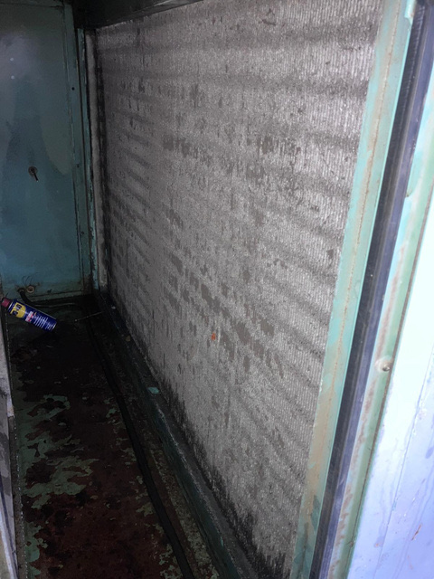 Fouled and degraded AHU frost coil before replacement at Farnborough car dealership