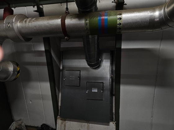 Plant room ductwork and colour-coded pipework at Kingly Street Office, London