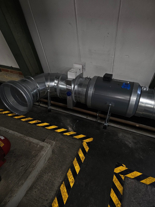 Inline centrifugal extract fan installed in plant room at Kingly Street Office