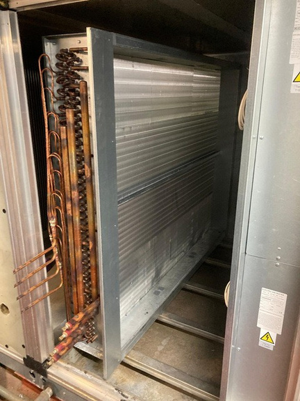 New reverse cycle coil installed with copper pipework inside AHU at Pembroke Offices