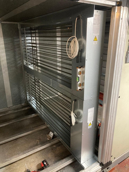 New electric heater battery installed inside AHU duct section at Pembroke Offices