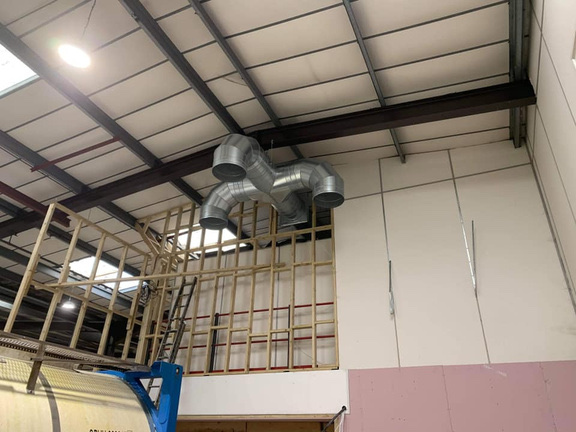 New spiral ductwork installed in the distillery ceiling as part of the extract ventilation system
