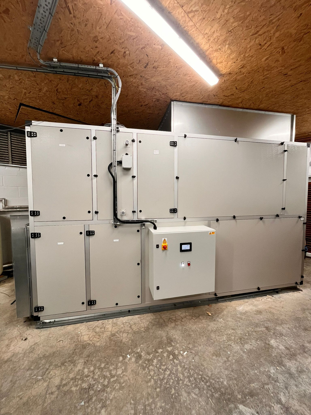 Newly installed bespoke AHU assembled in the Gunton Hall plantroom loft